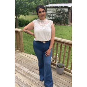 All white Boutique Blouse.